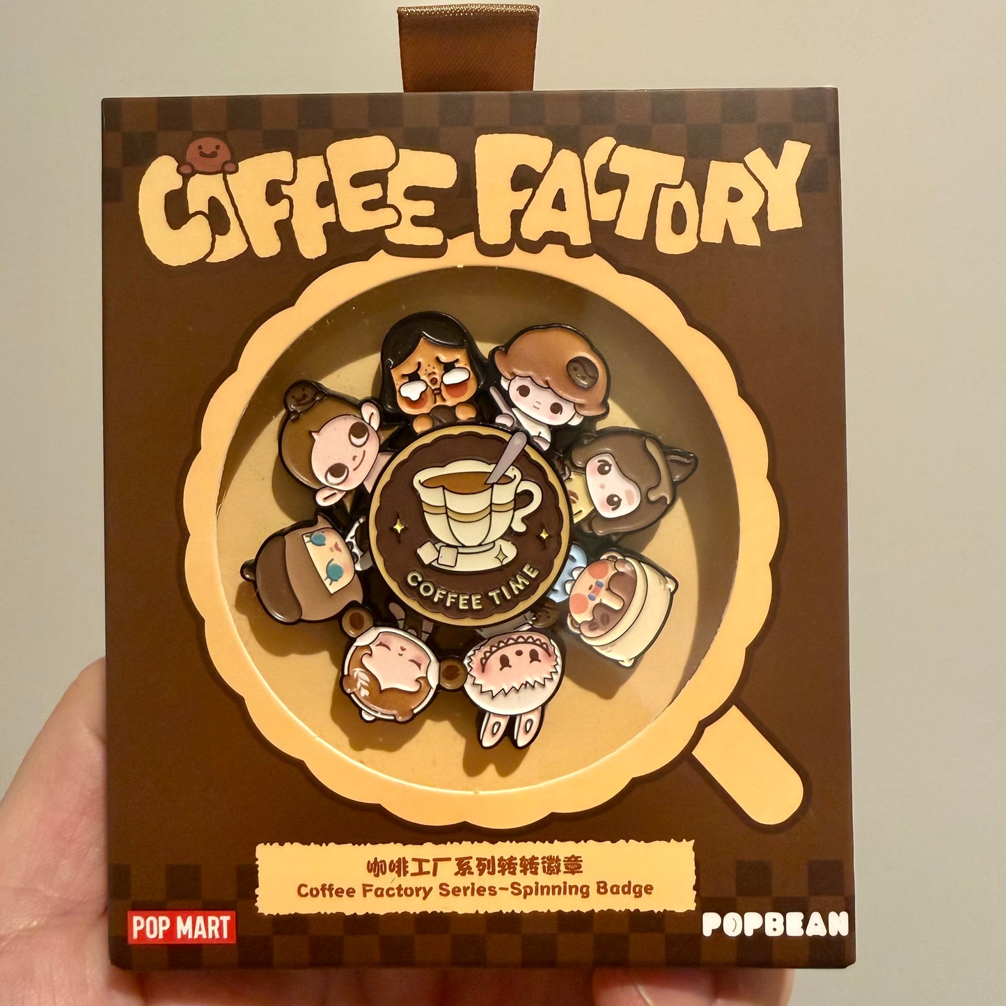 POP MART POP BEAN Coffee Factory Series Spinning Badge Front View