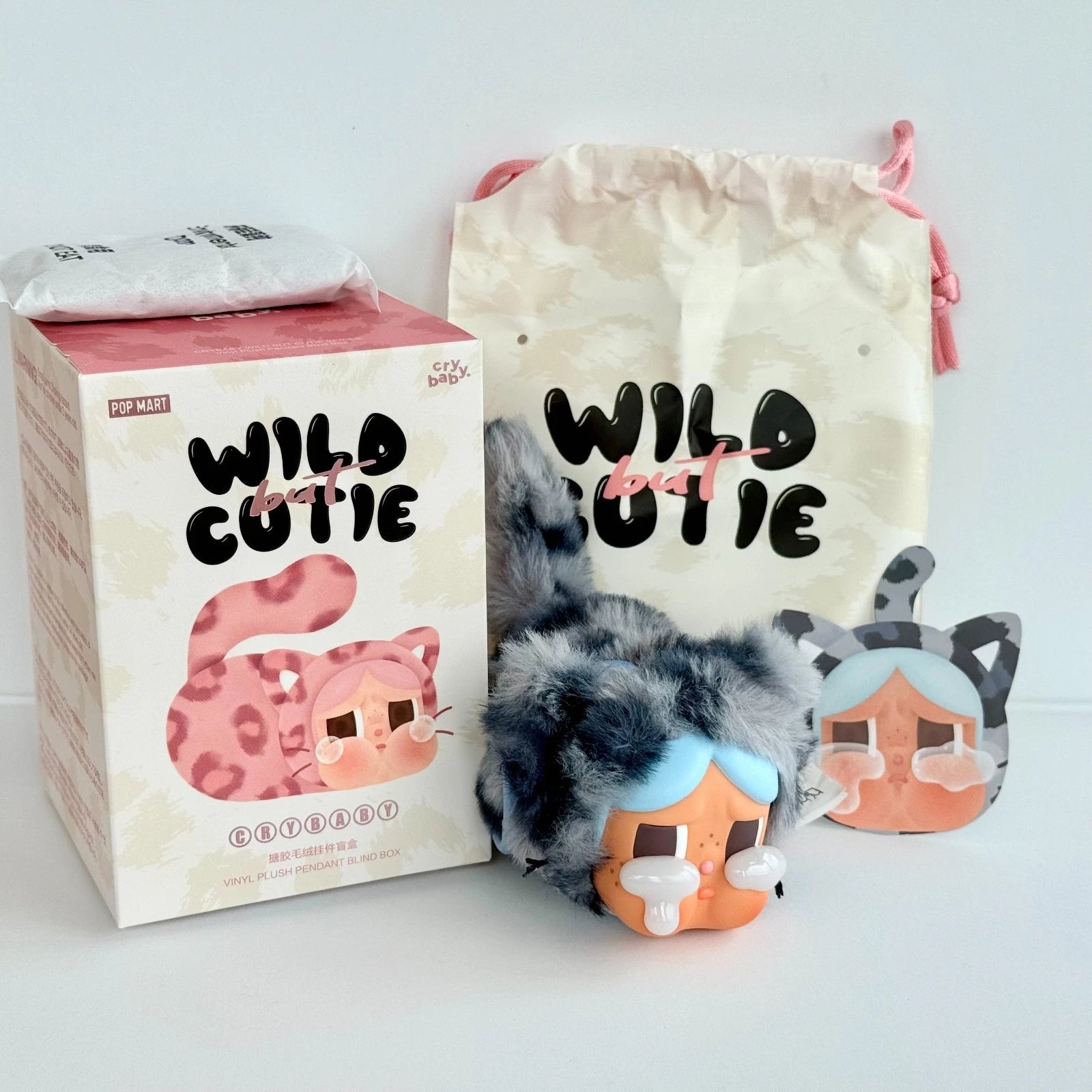 CRYBABY Wild but Cutie series blind box with original POP MART packaging, plush pendant and drawstring pouch denim cutie