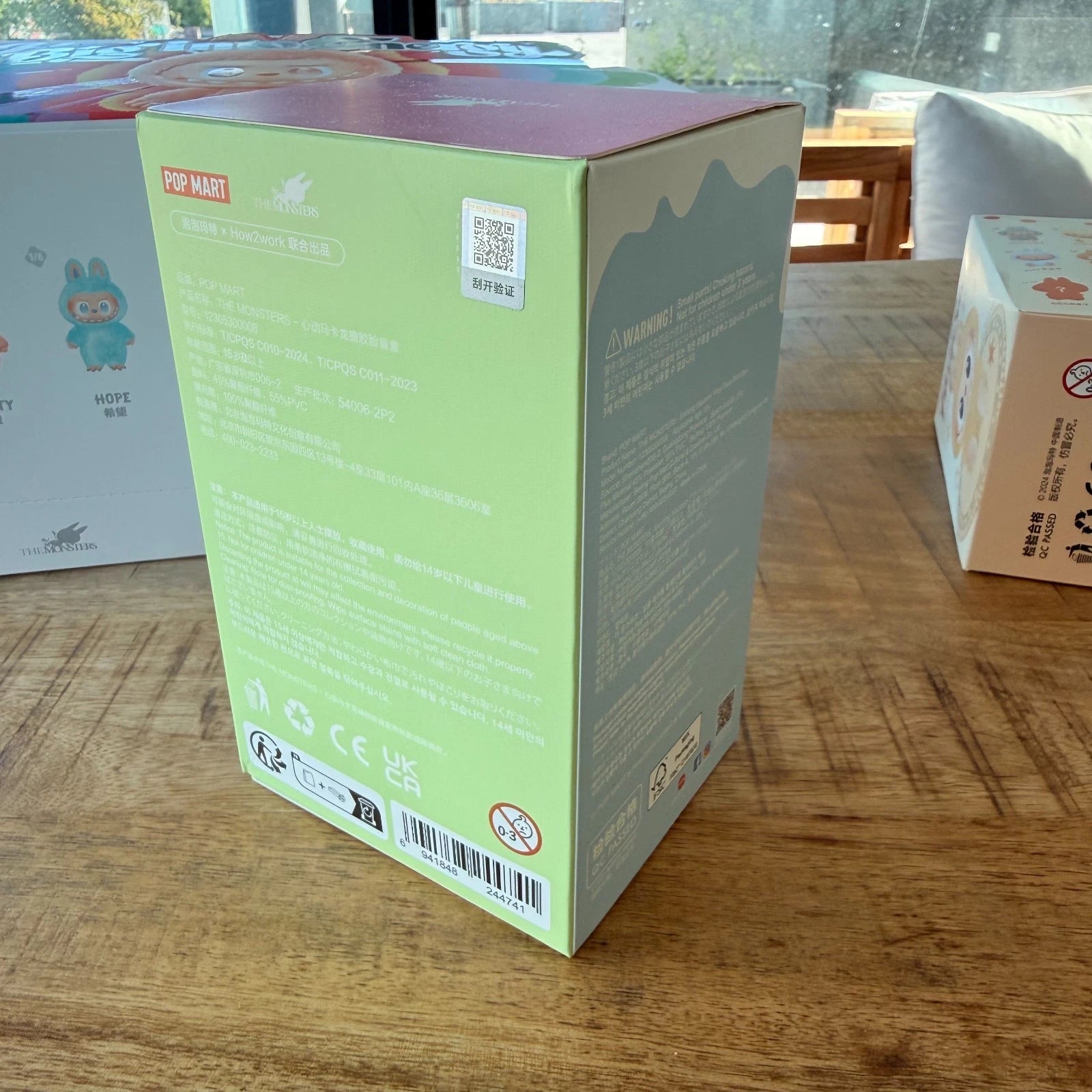 Original POP MART THE MONSTERS Exciting Macaron blind box sealed random figure, factory sealed back view